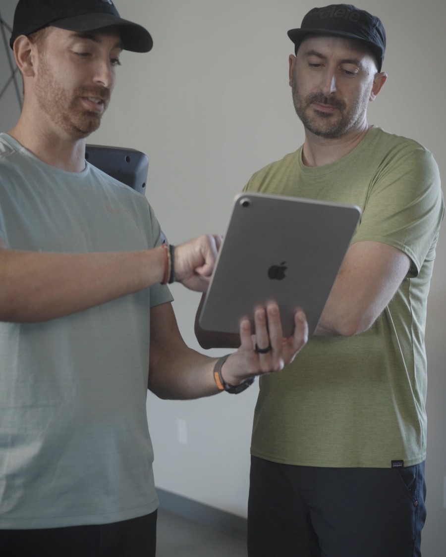 Matt Chaus reviewing a training plan with a client at Twenty One Run in South Jordan, UT