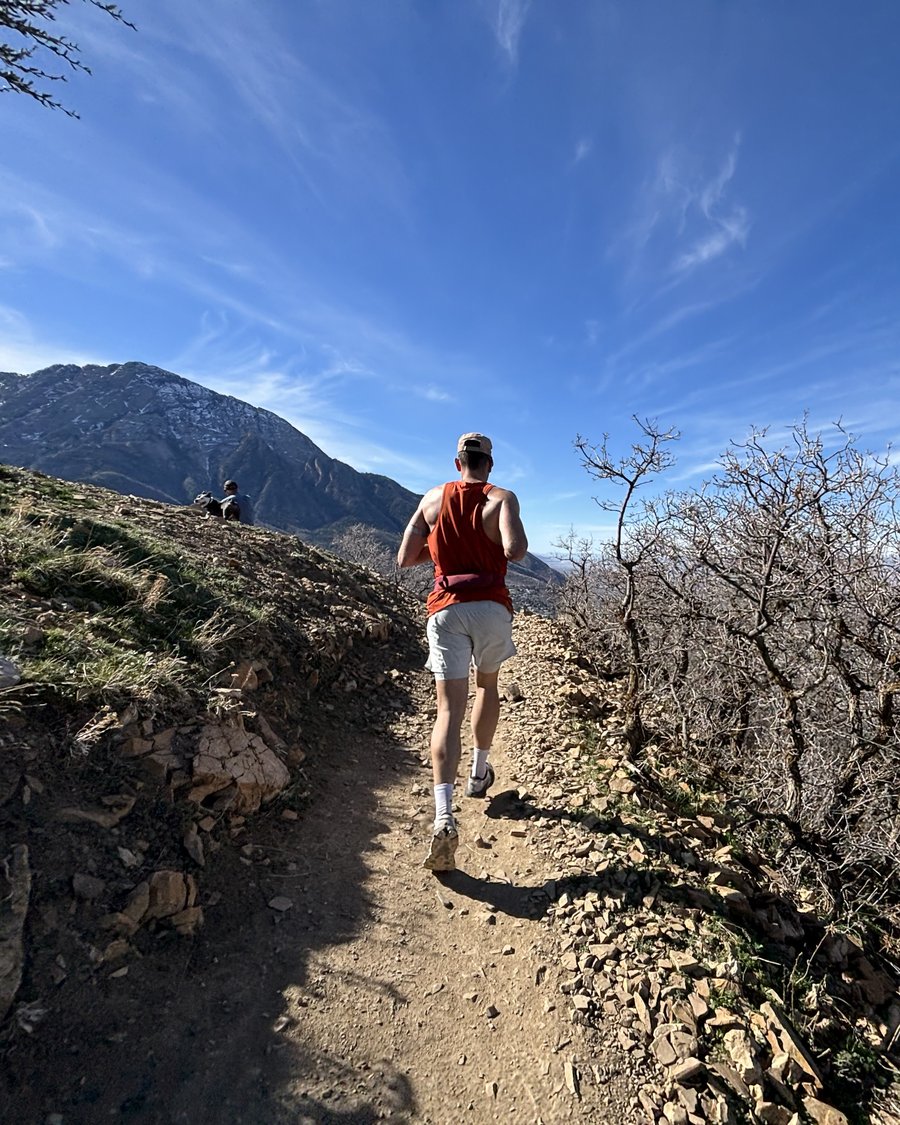 Matt Chaus trail running on a mountain ridge near Salt Lake City, Utah